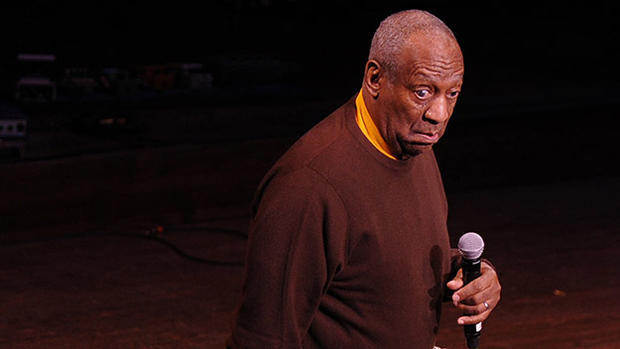 Comedian Bill Cosby performs onstage dur 