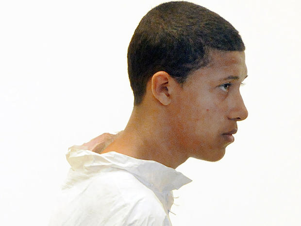 Philip Chism, 14, stands during his arraignment for the death of Danvers High School teacher Colleen Ritzer in Salem District Court in Salem, Mass., Oct. 23, 2013. 