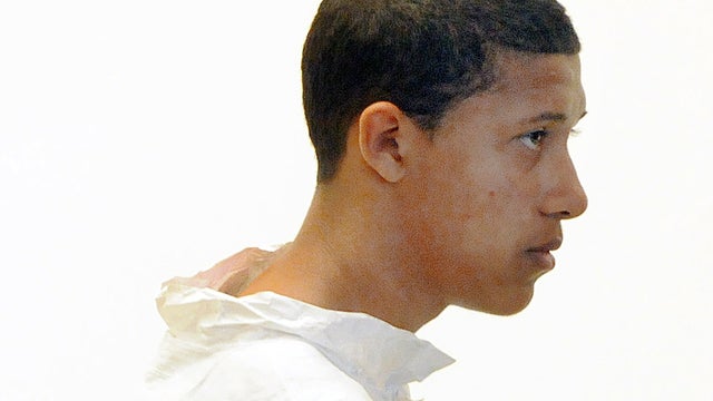 Philip Chism, 14, stands during his arraignment for the death of Danvers High School teacher Colleen Ritzer in Salem District Court in Salem, Mass., Oct. 23, 2013. 