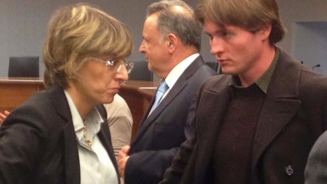 A picture taken with a mobile phone shows Raffaele Sollecito, right, with his lawyer Giulia Bongiorno 