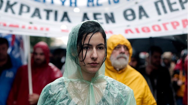 Members of pro-communist union PAME take part in an protest during a general strike in Athens 