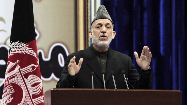 Afghan President Hamid Karzai speaks during the first day of the Loya Jirga in Kabul 