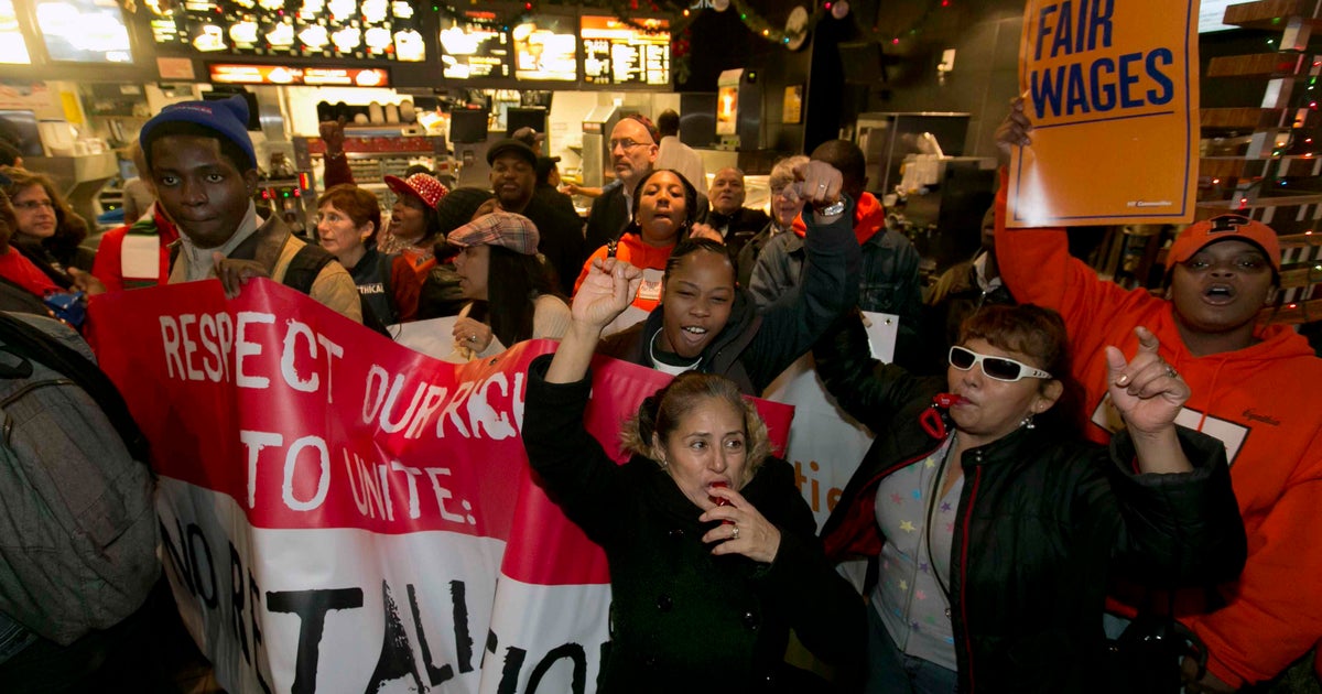 Fast-food workers rally for higher pay - CBS News
