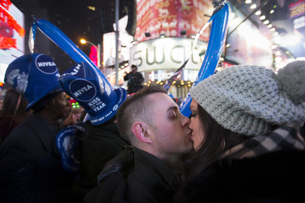 Rob Rudolph and Amanda Weaber share a kiss after midnight during the New Year's Eve celebrations in Times Square 