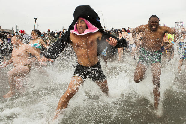 Polar Bear Club Swimmers Take Icy Plunge On New Years Day 