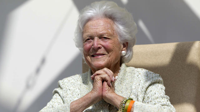 Former first lady Barbara Bush listens to a patient's question during a visit to the Barbara Bush Children's Hospital at Maine Medical Center in Portland, Maine, Aug. 22, 2013. 