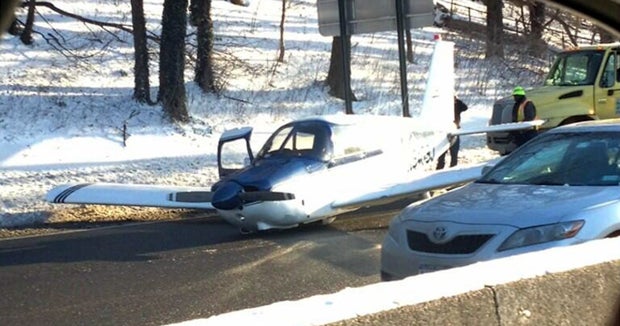 Small plane makes emergency landing on New York City highway - CBS News