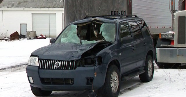 Deer goes through windshield, injures two - CBS News