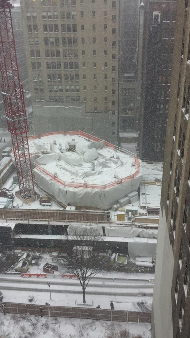 cellie-feva-new-building-going-up-on-madison-and-33-street-new-york-ny-dedicated-construction-worker-goes-above-and-beyond-in-the-snow.jpg 