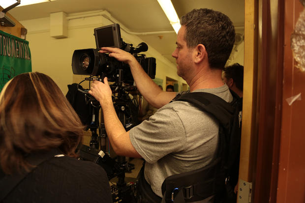 Steadi-cam operator Jeff Muhlstock fine tunes his camera before the big shoot. 