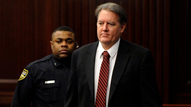 Defendant Michael Dunn is brought into the courtroom just before 5 p.m., where Judge Russell Healey announced that the jury was deadlocked on charge one and have verdicts on the other four charges as they deliberate in Dunn's trial Feb. 15, 2014, for the  
