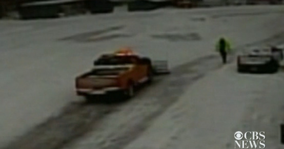 Caught on tape Snow plow buries truck on purpose CBS News