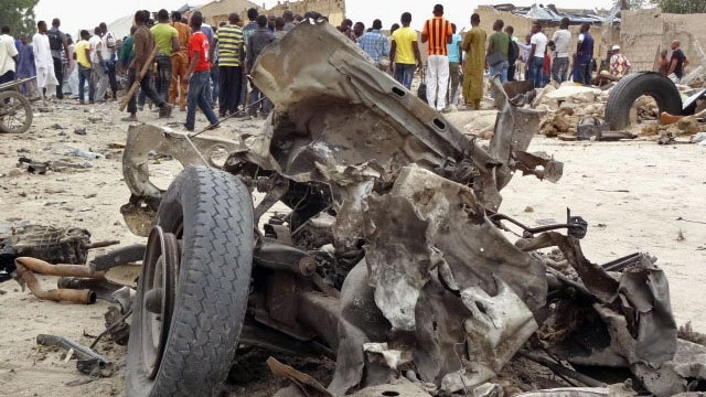 The remains of a car, after a twin car bomb exploded in Maiduguri, Nigeria 