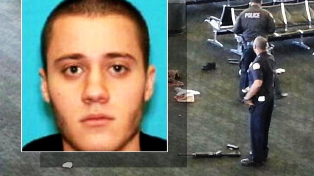 Suspected LAX gunman Paul Ciancia is seen over view of airport in wake of Nov. 1, 2013 shooting 
