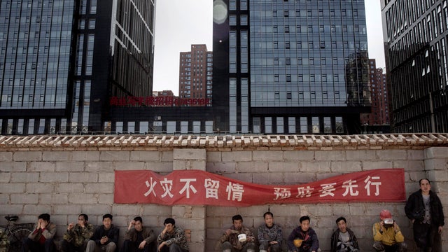 Chinese construction workers build new subway line 