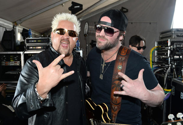 las-vegas-nv-april-05-tv-personality-guy-fieri-l-and-singer-lee-brice-pose-backstage-during-day-two-of-the-acm-party-for-a-cause-festival-at-the-linq.jpg 