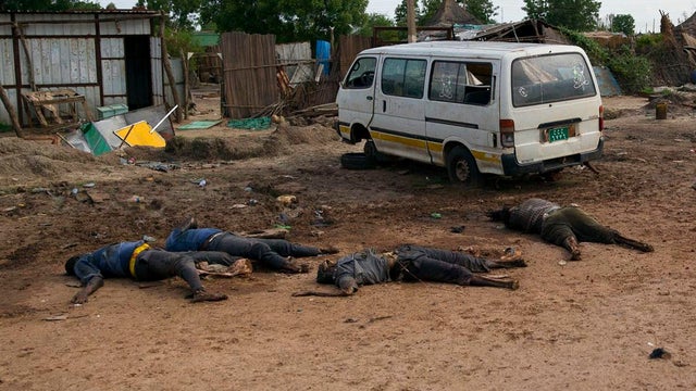 Slain bodies of civilians killed in renewed attacks lie along a road in Bentiu, Unity state of South Sudan 
