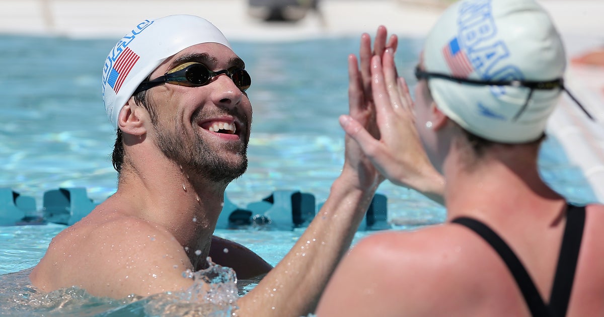 Michael Phelps impresses in his first comeback race - CBS News