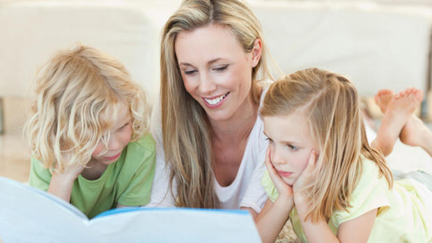 Mother Reading To Kids 