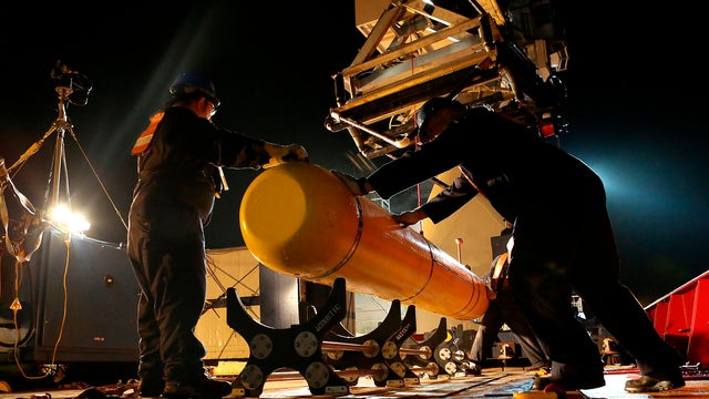 The Phoenix International Autonomous Underwater Vehicle (AUV) Artemis, also known as the Bluefin-21, is prepared for deployment from the Australian Defence Vessel Ocean Shield in the search for missing Malaysia Airlines Flight MH370 