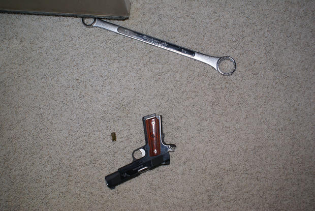 Wrench and gun found at the crime scene 