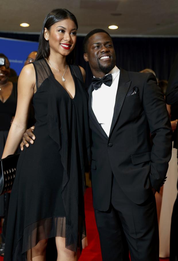 Actor Kevin Hart and Eniko Parrish arrive on the red carpet at the annual White House Correspondents' Association dinner in Washington May 3, 2014. 
