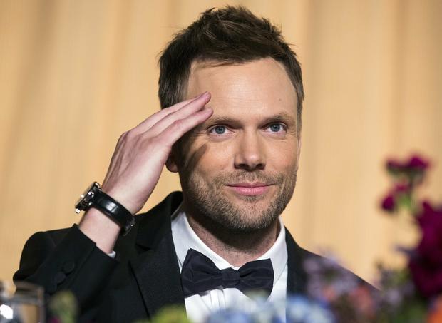 Comedian Joel McHale salutes the audience at the White House Correspondents' Association dinner in Washington May 3, 2014. 