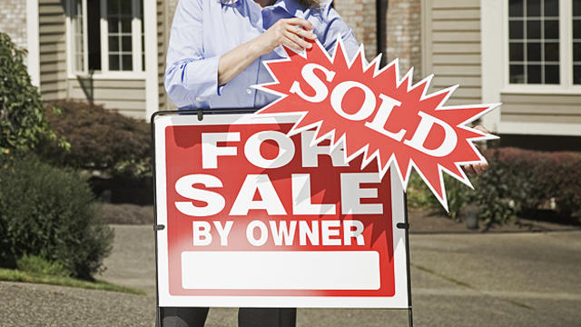 real_estate_sign_adding_sold.jpg 