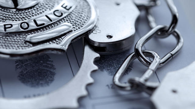 police-badge-handcuffs.jpg 