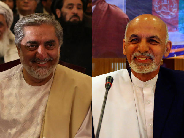 Afghan presidential candidates Abdullah Abdullah (left) and Ashraf Ghani Ahmadzai 