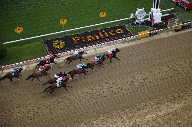 Victor Espinoza aboard Majestic Hussar leads the fifth race of the day before the 139th Preakness Stakes at Pimlico Race Course in Baltimore May 17, 2014. 