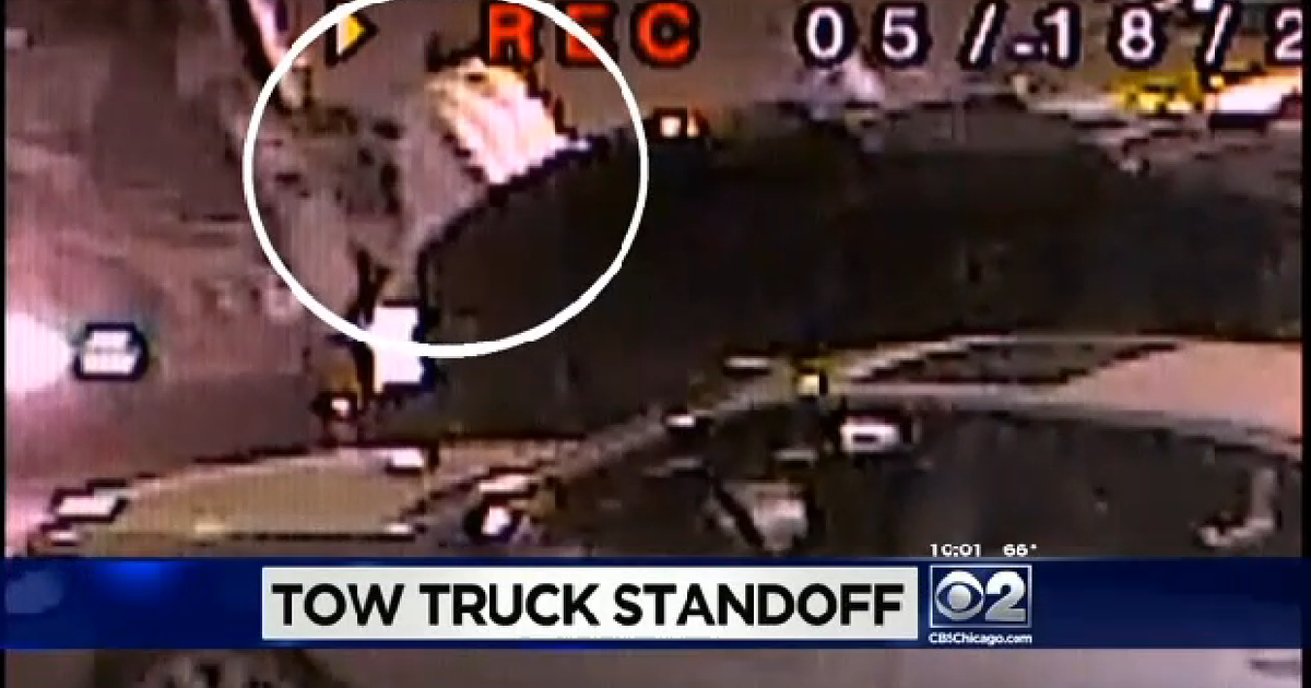 VIDEO: Woman jumps on SUV to prevent illegal tow in Evanston, Illinois ...