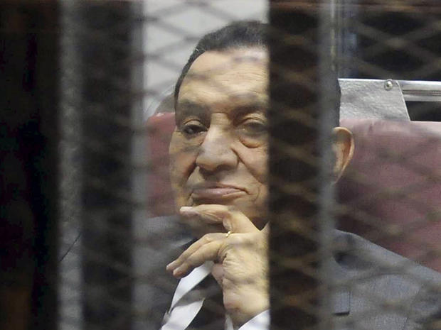 Egypt's ousted President Hosni Mubarak inside a dock 
