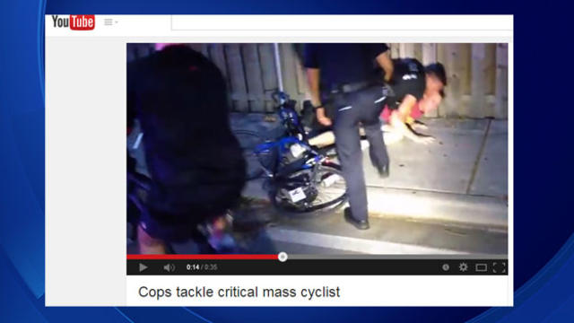 cops-tackle-cyclist.jpg 