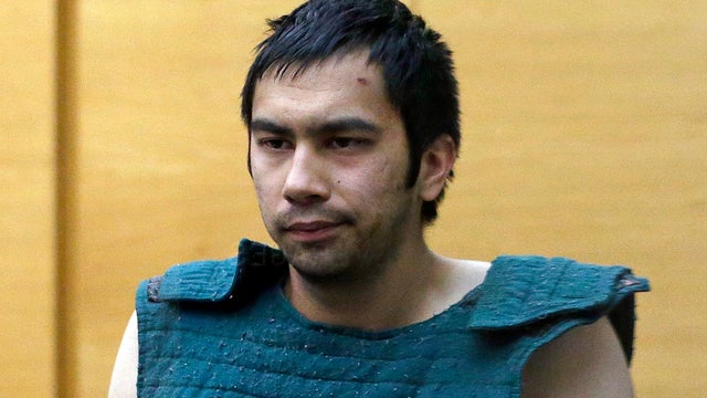 Shooting suspect Aaron Ybarra is led to a court hearing at a King County Jail courtroom June 6, 2014, in Seattle. 