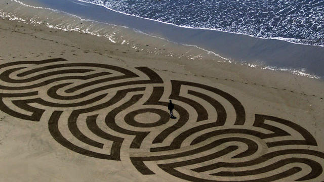 Andres Amador leads massive sand art project at Swami's Beach