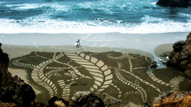 Sand artist uses beaches as his canvas 