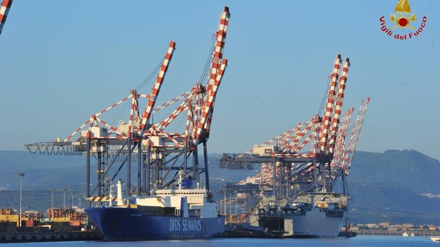 The Danish ship Ark Futura, carrying a cargo of Syria's chemical weapons, sits docked in front of the U.S. ship MV Cape Ray as it arrives at Gioia Tauro port in Italy 