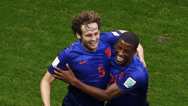 Daley Blind of the Netherlands celebrates his goal against Brazil with teammate Georginio Wijnaldum during their 2014 World Cup third-place playoff at the Brasilia national stadium in Brasilia July 12, 2014. 