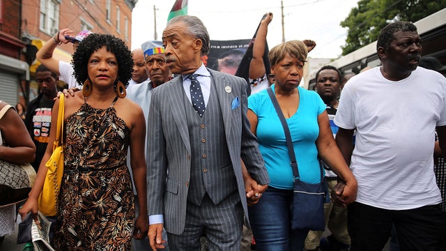 The Rev. Al Sharpton marches with family members of Eric Garner and hundreds of others during a demonstration July 19, 2014, in New York City against the death of Eric Garner after he was taken into police custody in Staten Island. 