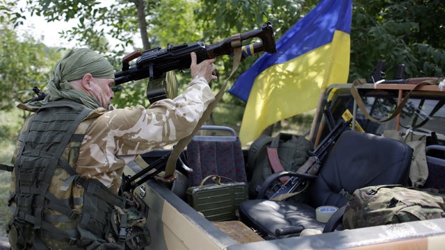 Ukrainian servicemen prepare for redeployment from Popasna, Lugansk region, freed by Ukrainian forces from the pro-Russian militants, to Donetsk 
