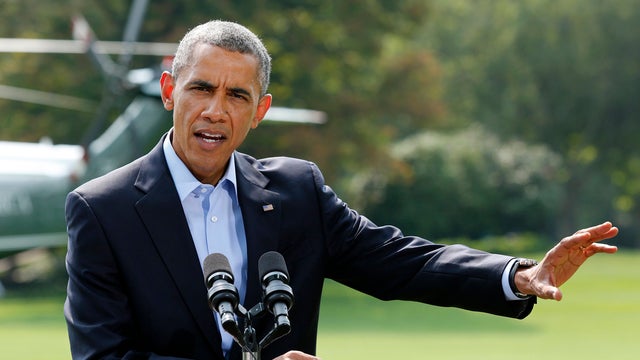 President Obama speaks on the situation in Iraq on the South Lawn of the White House in Washington Aug. 9, 2014, before his departure for vacation in Martha's Vineyard, Massachusetts. 