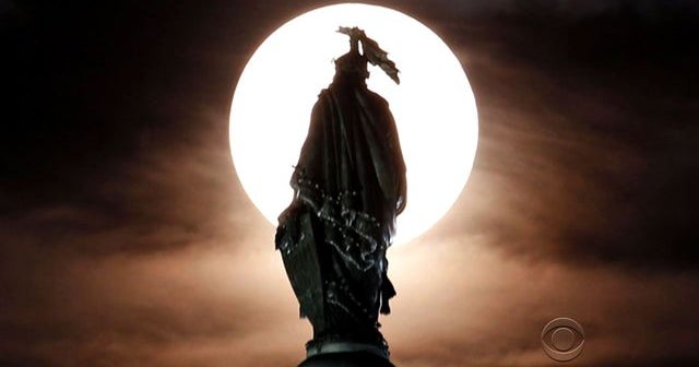 Supermoon lights up night sky around the world - CBS News