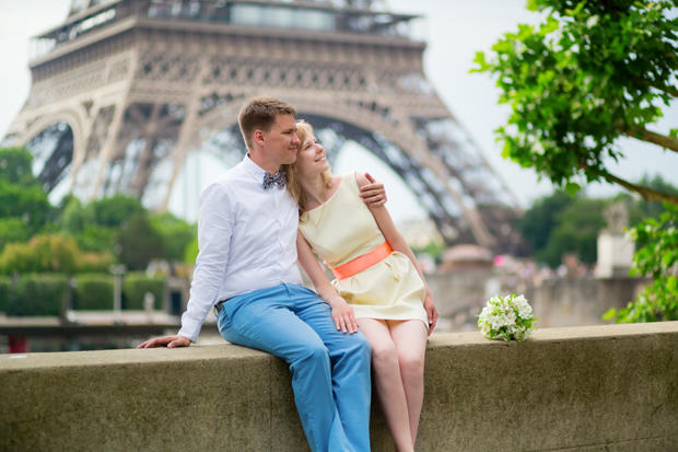 Just married couple hugging near the Eiffel tower love engagement proposal wedding 