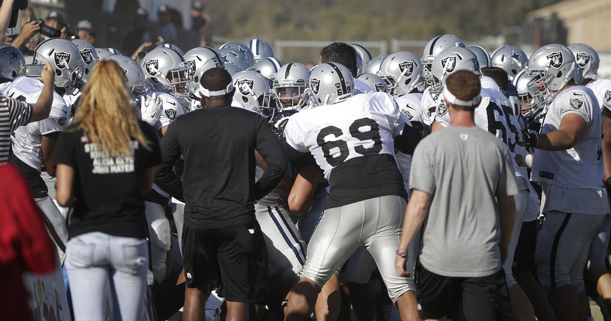 Cowboys and Raiders brawl at practice; fan gets involved - CBS News