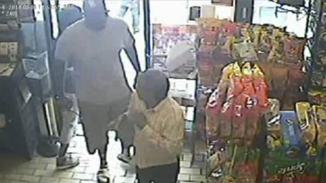 An incident in a store in Ferguson, Missouri, Aug. 9, 2014, is seen in this still image taken from a security camera and presented to the media during a news conference by the Ferguson Police Department Aug. 15, 2014. 