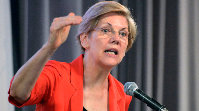 In this file photo, Sen. Elizabeth Warren, D-Mass., speaks to a group of supporters at a rally for Kentucky Democratic Senate candidate Alison Lundergan Grimes June 29, 2014, at the University of Louisville in Louisville, Ky. 