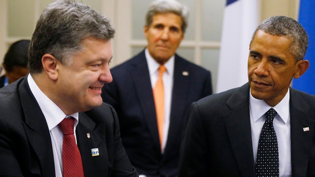 President Obama is seated with Ukrainian President Petro Poroshenko as they meet with other countries regarding Ukraine at the NATO summit at Celtic Manor in Newport, Wales, Sept. 4, 2014. At rear center is U.S. Secretary of State John Kerry. 