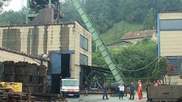 ​Mine and rescue officials are seen near the entrance to the Zenica coal mine in central Bosnia 