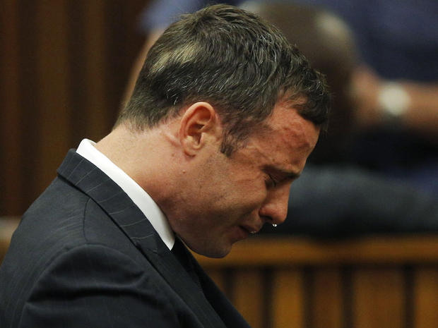 Olympic and Paralympic track star Oscar Pistorius reacts as he listens to Judge Thokozile Masipa's judgement at the North Gauteng High Court in Pretoria 